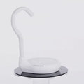 AiryFairy Automated Candle Extinguisher, a stylish safety device designed to prevent candle over-burning.