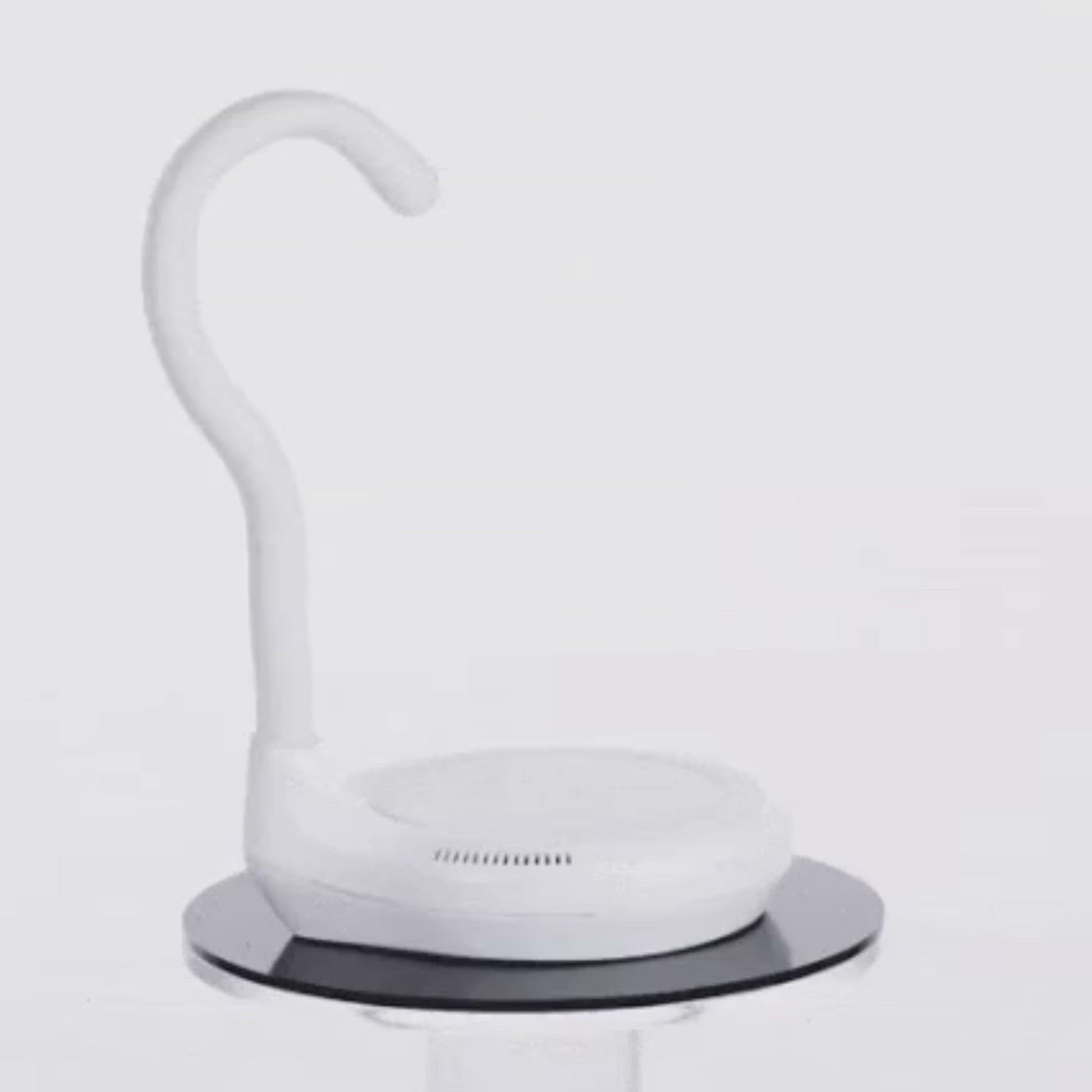 AiryFairy Automated Candle Extinguisher, a stylish safety device designed to prevent candle over-burning.